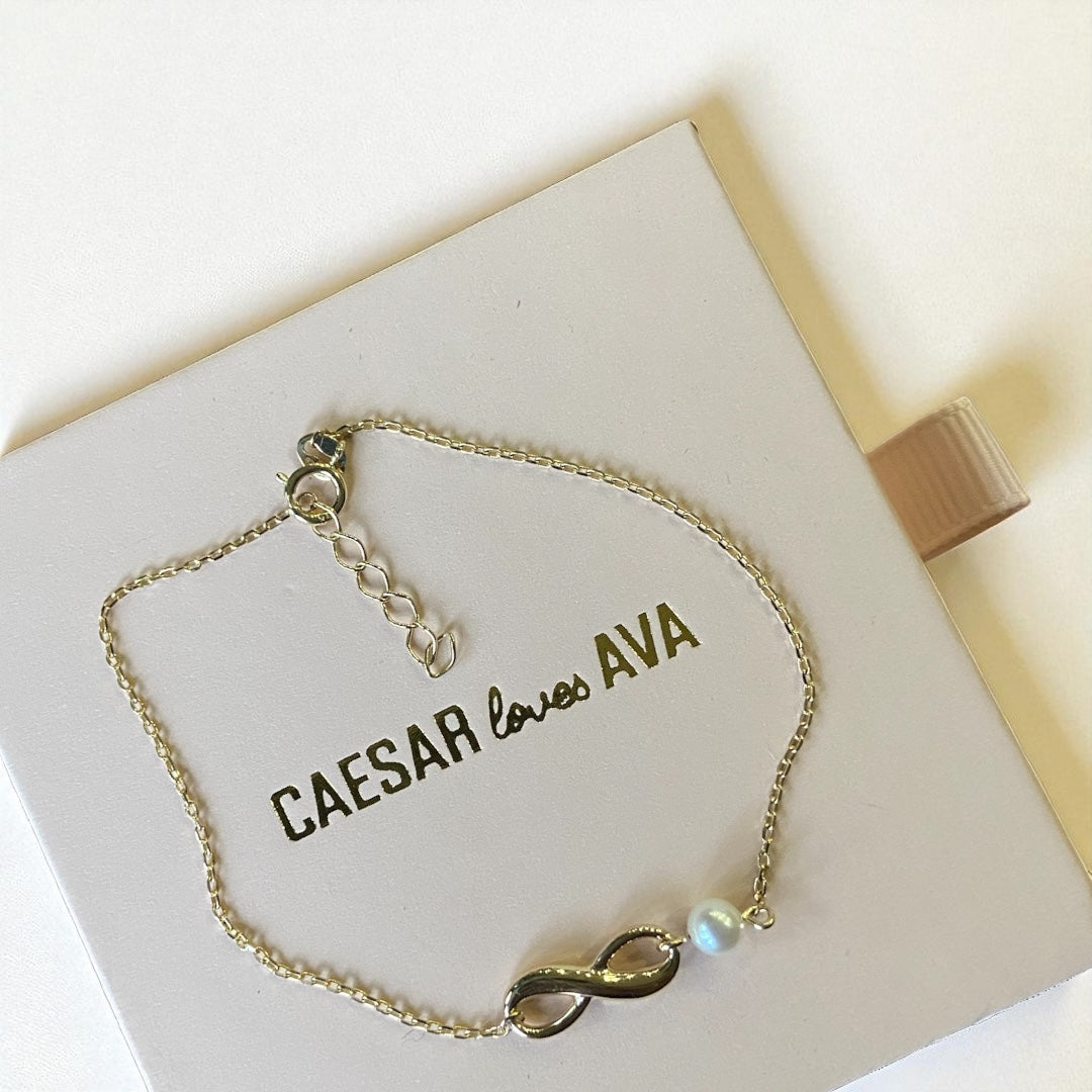 Maggie Solid Gold Infinity Bracelet with Freshwater Pearl - Caesar Loves Ava
